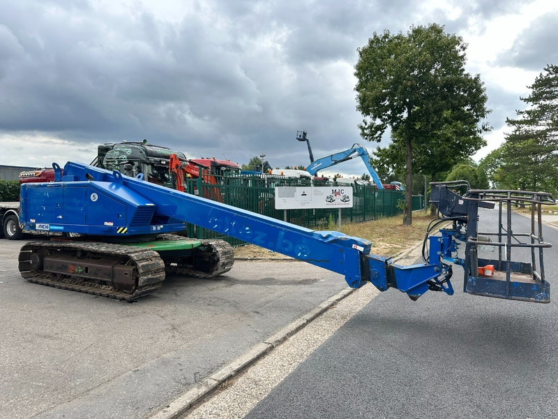 Aichi SR18A 18.00m - TRACKS / RAUPE - 227kg - DIESEL ISUZU - BE MACHINE - معدات الوصول: صورة 1 Aichi SR18A 18.00m - TRACKS / RAUPE - 227kg - DIESEL ISUZU - BE MACHINE - معدات الوصول: صورة 1