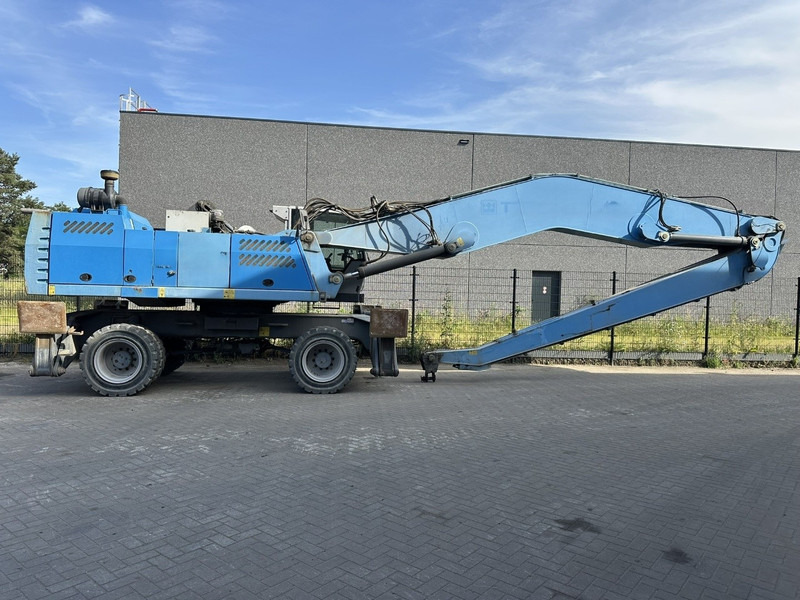 Fuchs MHL 360 OVERSLAGKRAAN / MATERIAL HANDLER / UMSCHLAGBAGGER - TOP ZUSTAND - معالج النفايات: صورة 1 Fuchs MHL 360 OVERSLAGKRAAN / MATERIAL HANDLER / UMSCHLAGBAGGER - TOP ZUSTAND - معالج النفايات: صورة 1