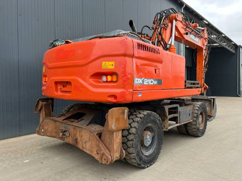 Doosan DX210W - حفارة دولاب: صورة 4 Doosan DX210W - حفارة دولاب: صورة 4