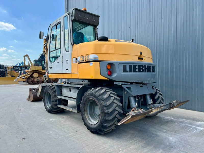 Liebherr A311 Litronic - حفارة دولاب: صورة 2 Liebherr A311 Litronic - حفارة دولاب: صورة 2