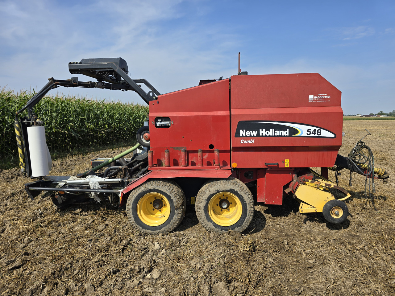 NEW HOLLAND 548 Combi - مكنة: صورة 1 NEW HOLLAND 548 Combi - مكنة: صورة 1