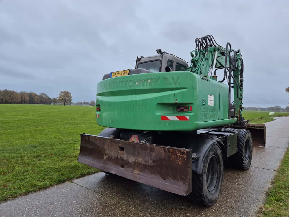 HITACHI ZX 130 W - حفارة دولاب: صورة 4 HITACHI ZX 130 W - حفارة دولاب: صورة 4