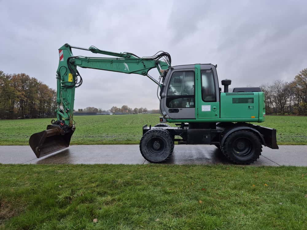 HITACHI ZX 130 W - حفارة دولاب: صورة 1 HITACHI ZX 130 W - حفارة دولاب: صورة 1