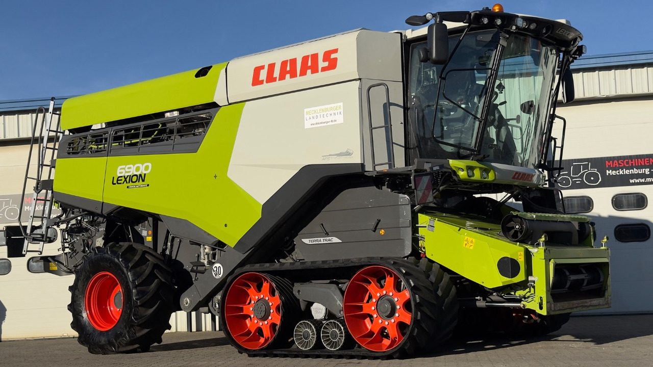CLAAS Lexion 6900 TerraTrac 890 full Options - حصادة موحَّدة: صورة 1 CLAAS Lexion 6900 TerraTrac 890 full Options - حصادة موحَّدة: صورة 1
