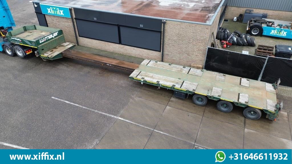 Goldhofer 3-ass. Uitschuifbare semi dieplader / 3x gestuurd - عربة منخفضة مسطحة نصف مقطورة: صورة 2 Goldhofer 3-ass. Uitschuifbare semi dieplader / 3x gestuurd - عربة منخفضة مسطحة نصف مقطورة: صورة 2