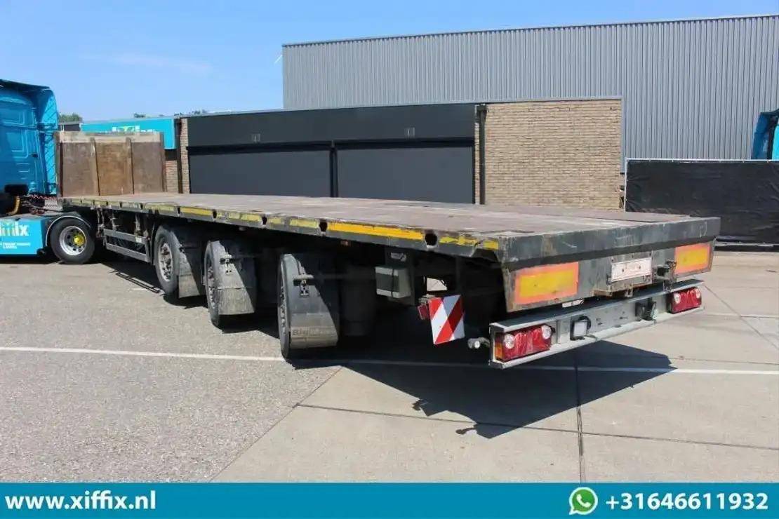 Meusburger 3-ass. Vlakke uitschuifbare oplegger / 2x gestuurd / 13819 - نصف مقطورة مسطحة: صورة 3 Meusburger 3-ass. Vlakke uitschuifbare oplegger / 2x gestuurd / 13819 - نصف مقطورة مسطحة: صورة 3