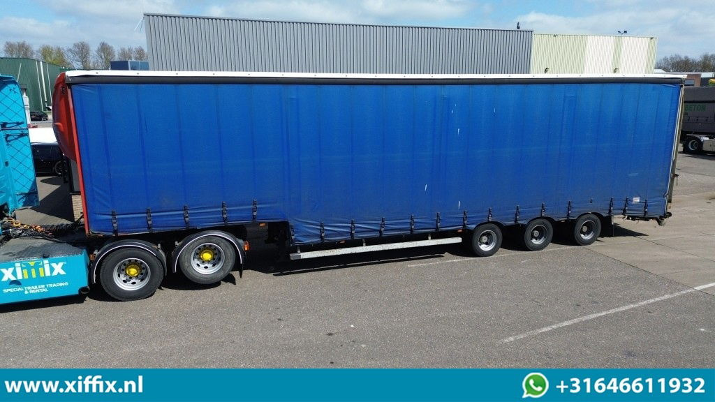 Nooteboom 3-ass. Semi dieplader met huifopbouw / Laadklep - عربة منخفضة مسطحة نصف مقطورة: صورة 1 Nooteboom 3-ass. Semi dieplader met huifopbouw / Laadklep - عربة منخفضة مسطحة نصف مقطورة: صورة 1