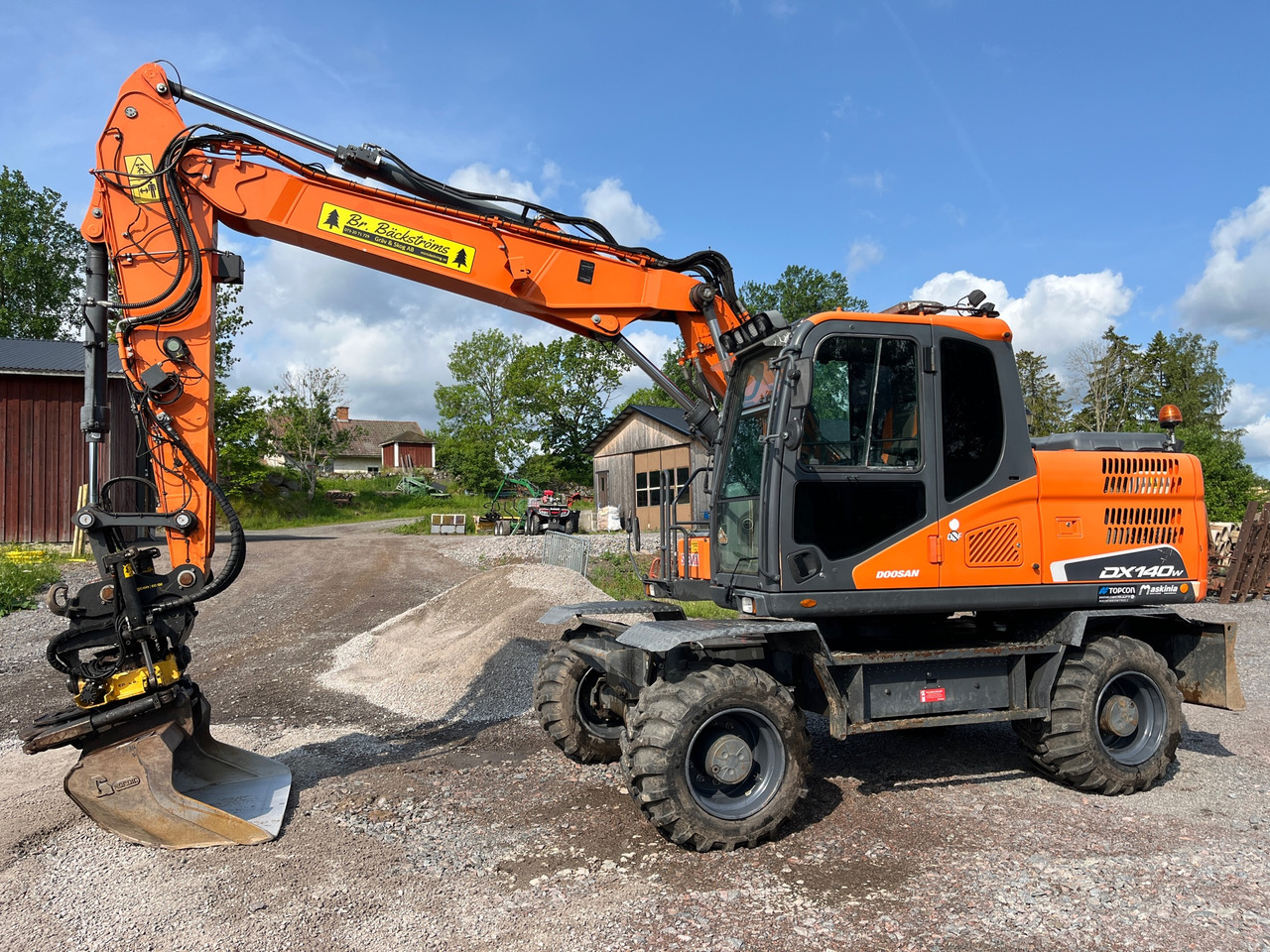 Doosan DX140W-5 - حفارة: صورة 1 Doosan DX140W-5 - حفارة: صورة 1