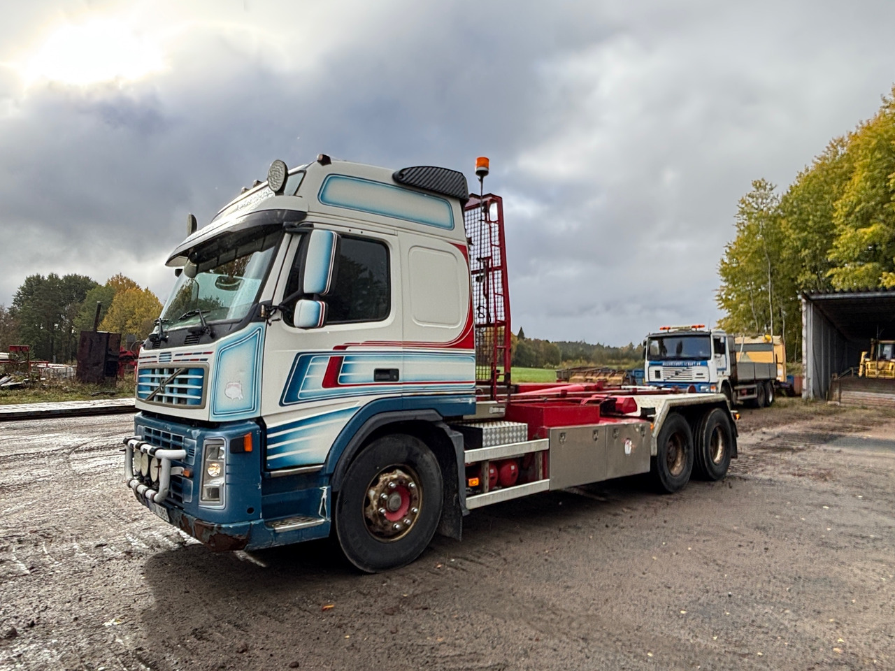 Volvo FM9-12 - شاحنة ذات خطاف: صورة 1 Volvo FM9-12 - شاحنة ذات خطاف: صورة 1