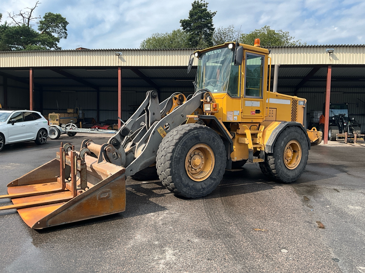 Volvo L70D - اللودر بعجل: صورة 1 Volvo L70D - اللودر بعجل: صورة 1