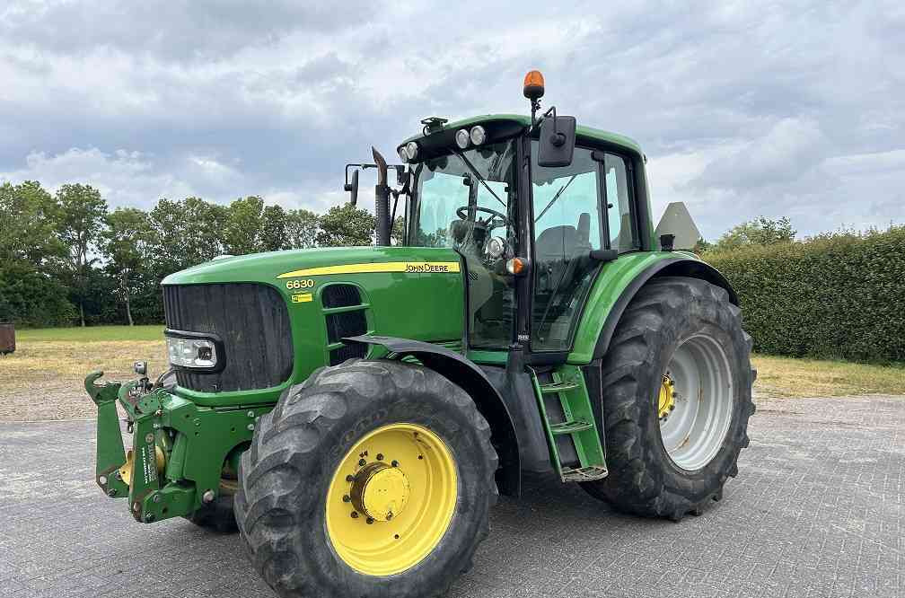 John Deere 6630 premium, 7100 uur, tls, pto, gps - جرار: صورة 1 John Deere 6630 premium, 7100 uur, tls, pto, gps - جرار: صورة 1
