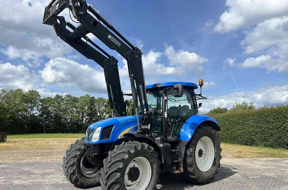 New Holland TSA 125, frontlader - جرار: صورة 1 New Holland TSA 125, frontlader - جرار: صورة 1