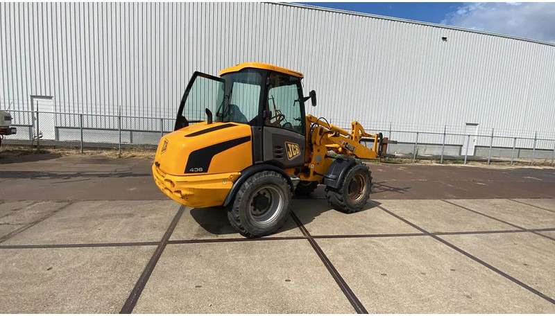 JCB KNIKSCHOVEL 406 - اللودر بعجل: صورة 4 JCB KNIKSCHOVEL 406 - اللودر بعجل: صورة 4