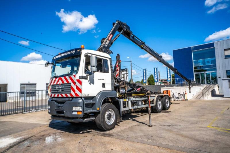 MAN TGA 26.320 BL -6X2-4+HIAB 122 E3 HIDUO - شاحنة ذات خطاف, شاحنة كرين: صورة 1 MAN TGA 26.320 BL -6X2-4+HIAB 122 E3 HIDUO - شاحنة ذات خطاف, شاحنة كرين: صورة 1