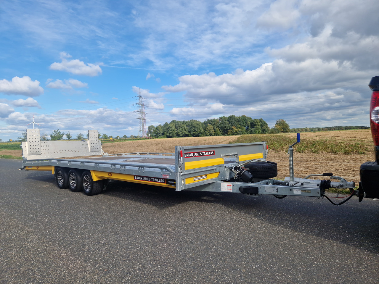 BJT T Transporter 231 550x224cm yellow ankippbar Heckrampe Tridem Alufelgen 10" 3500kg - مقطورة شحن نقل السيارات: صورة 3 BJT T Transporter 231 550x224cm yellow ankippbar Heckrampe Tridem Alufelgen 10" 3500kg - مقطورة شحن نقل السيارات: صورة 3
