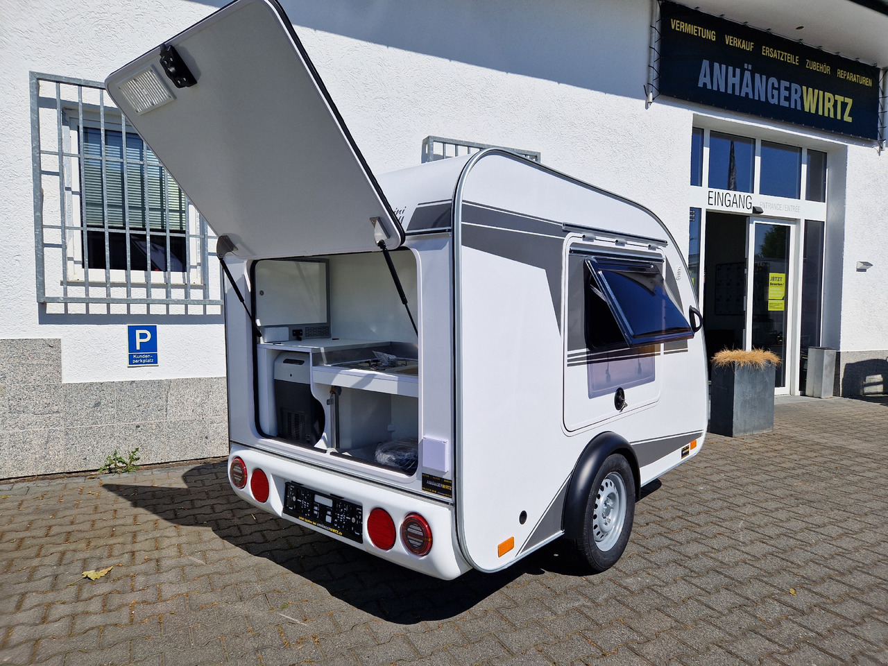 كرفان سحب Mini Camper Mini Tommy TMC25 252x140x121cm aero V1 Küche 12V/230V 100km/H 750kg gebremst Modell 24: صورة 16