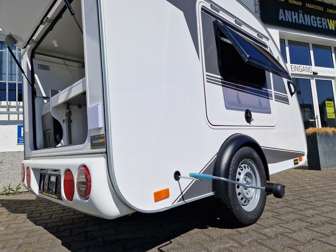 كرفان سحب Mini Camper Mini Tommy TMC25 252x140x121cm aero V1 Küche 12V/230V 100km/H 750kg gebremst Modell 24: صورة 18