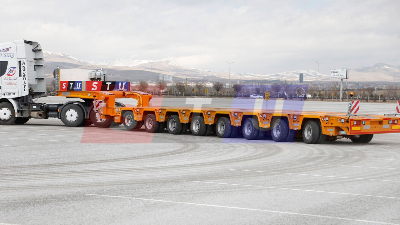 STU 8 AXLE LOWBED- HYDRAULIC STEERING AXLES / 8 ESSİEUX SURBAISSES-E - عربة منخفضة مسطحة نصف مقطورة: صورة 1 STU 8 AXLE LOWBED- HYDRAULIC STEERING AXLES / 8 ESSİEUX SURBAISSES-E - عربة منخفضة مسطحة نصف مقطورة: صورة 1