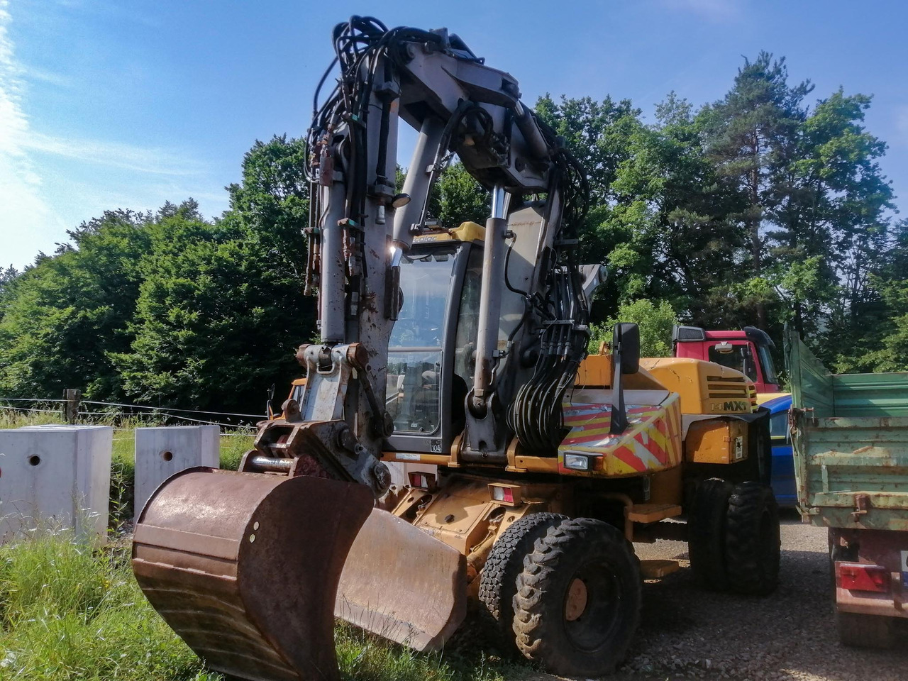 MECALAC 14 MXT - حفارة دولاب: صورة 1 MECALAC 14 MXT - حفارة دولاب: صورة 1