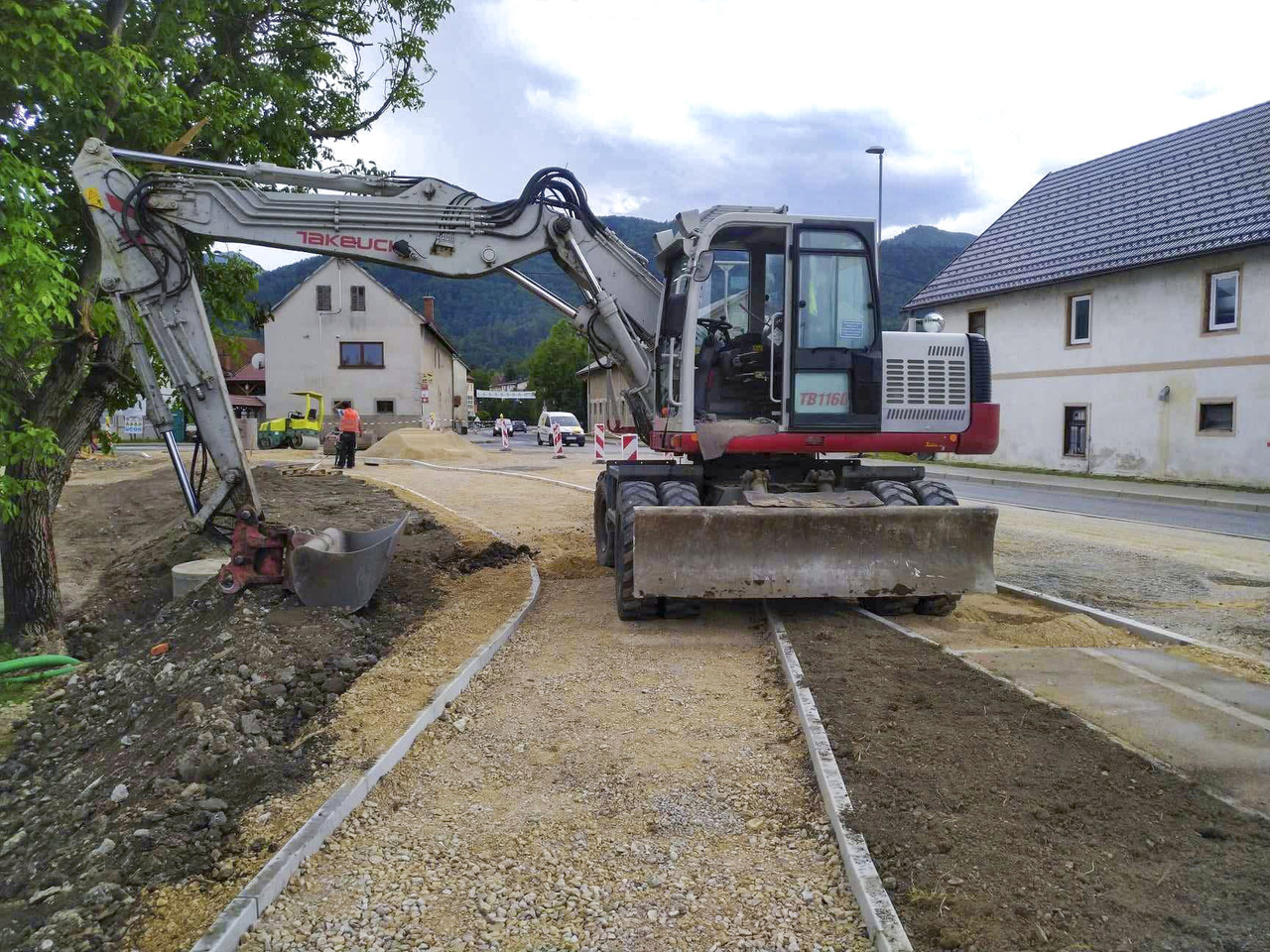Takeuchi TB1160W - حفارة دولاب: صورة 1 Takeuchi TB1160W - حفارة دولاب: صورة 1