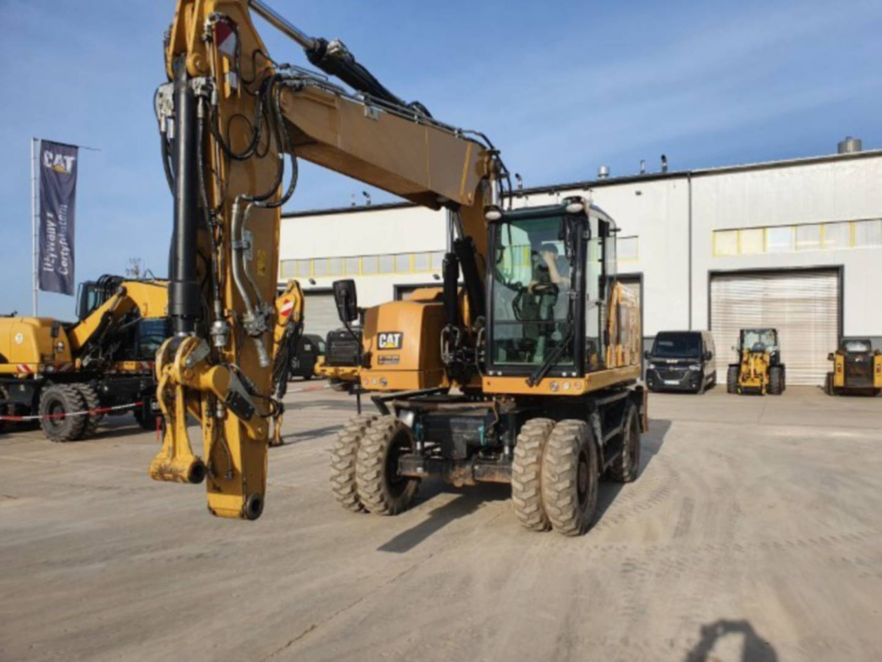 CAT M318F - حفارة دولاب: صورة 1 CAT M318F - حفارة دولاب: صورة 1