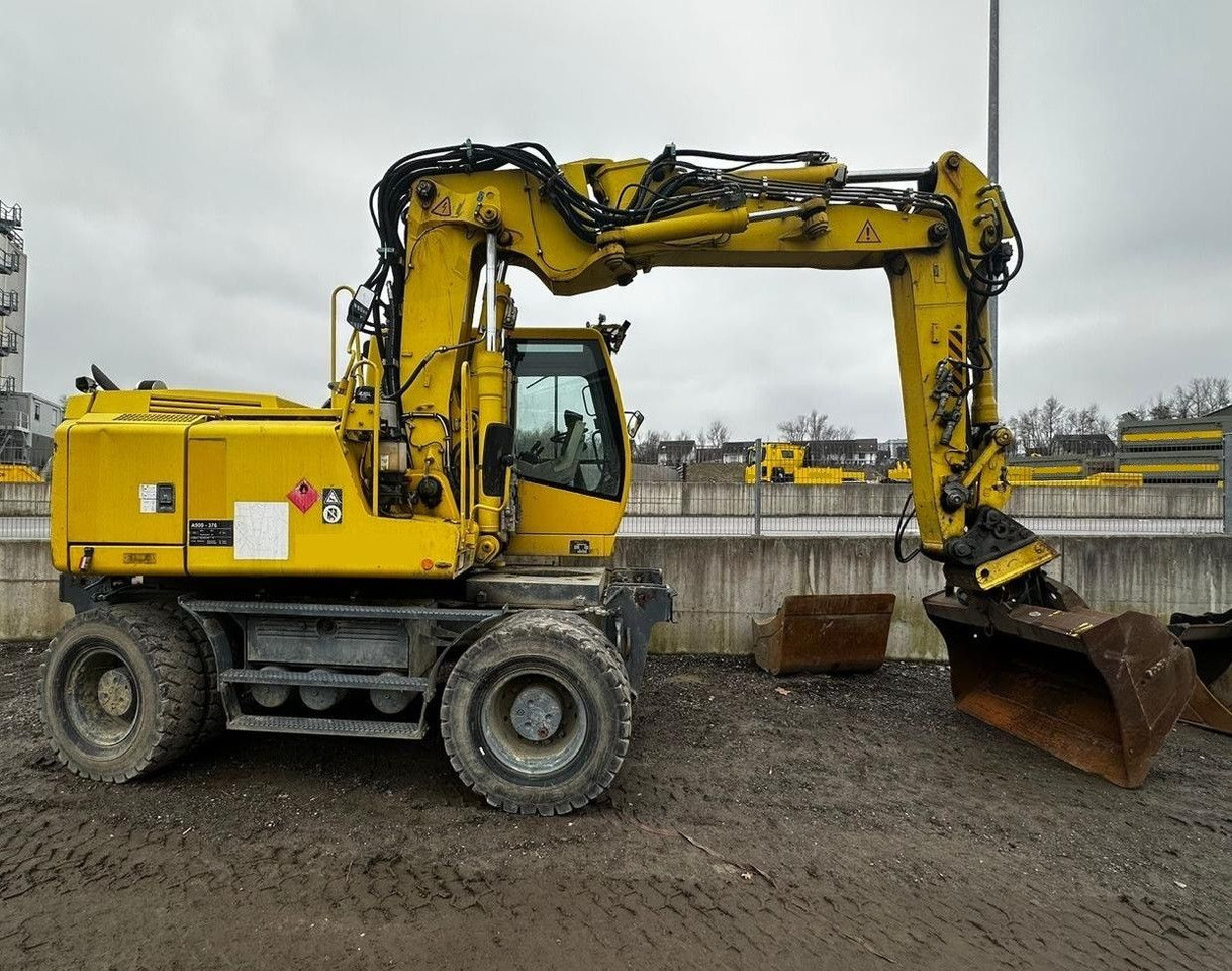 Liebherr A900C ZW Litronic PFS 2, Rail+Road, Gleisbagger - حفارة دولاب: صورة 1 Liebherr A900C ZW Litronic PFS 2, Rail+Road, Gleisbagger - حفارة دولاب: صورة 1