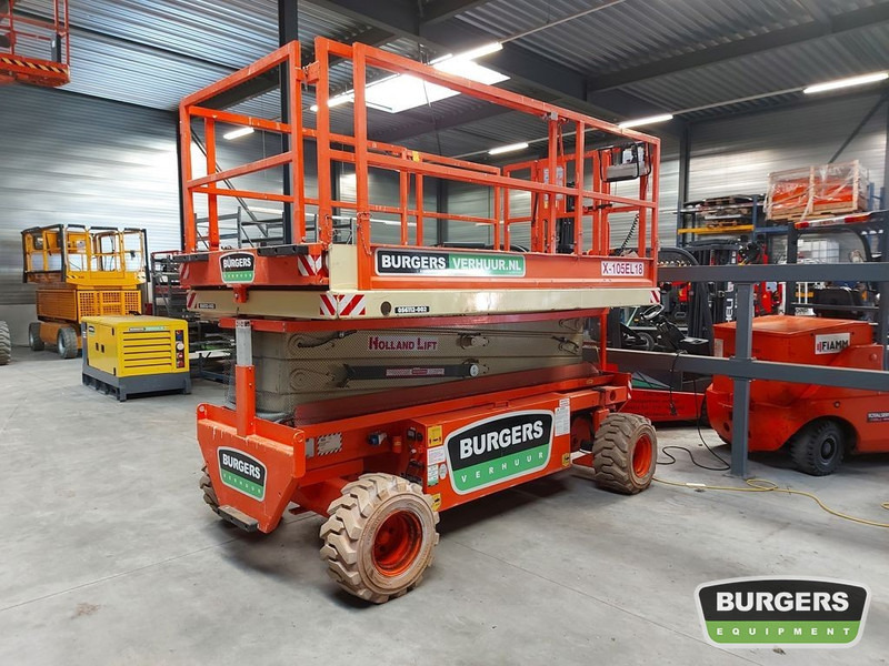 HOLLANDLIFT X-105EL18 - رافعة هيدروليكية مقصية: صورة 1 HOLLANDLIFT X-105EL18 - رافعة هيدروليكية مقصية: صورة 1