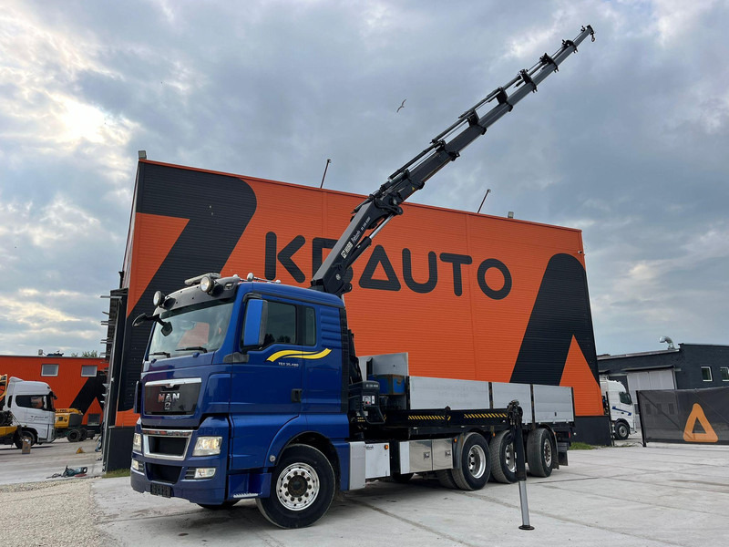 MAN TGX 35.480 8x4*4 HIAB 288E-7 / PLATFORM L=6397 mm - شاحنات مسطحة, شاحنة كرين: صورة 1 MAN TGX 35.480 8x4*4 HIAB 288E-7 / PLATFORM L=6397 mm - شاحنات مسطحة, شاحنة كرين: صورة 1