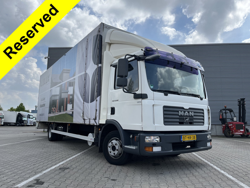 MAN TGL 12.180 Euro 4 / 12 Ton / 781 dkm / Canvas Box / APK TUV 10-25 - شاحنة مقفلة: صورة 1 MAN TGL 12.180 Euro 4 / 12 Ton / 781 dkm / Canvas Box / APK TUV 10-25 - شاحنة مقفلة: صورة 1