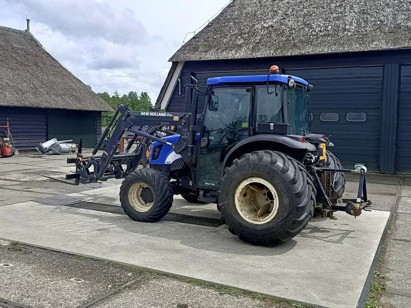 New Holland TN60DA TN60D met voorlader 520TL en vork - جرار: صورة 3 New Holland TN60DA TN60D met voorlader 520TL en vork - جرار: صورة 3