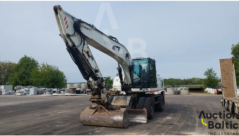 Caterpillar M 322 D - حفارة دولاب: صورة 1 Caterpillar M 322 D - حفارة دولاب: صورة 1