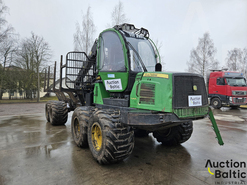 John Deere 1010 E - مقطورة الغابات: صورة 1 John Deere 1010 E - مقطورة الغابات: صورة 1