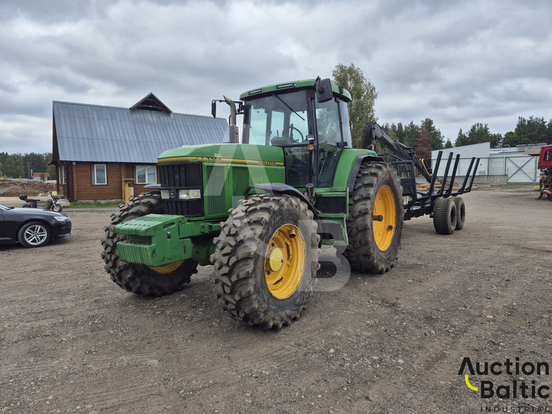 John Deere 7700 - مقطورة الغابات: صورة 1 John Deere 7700 - مقطورة الغابات: صورة 1