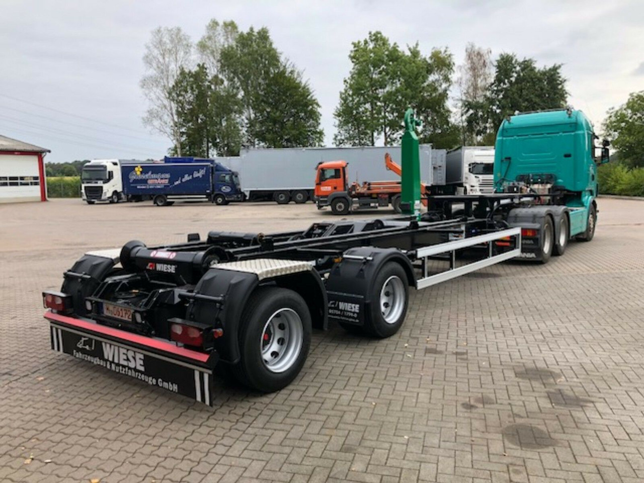 Auflieger Abrollkipper Hakenlift Hooklift - نصف مقطورة لنقل الحاويات: صورة 3 Auflieger Abrollkipper Hakenlift Hooklift - نصف مقطورة لنقل الحاويات: صورة 3