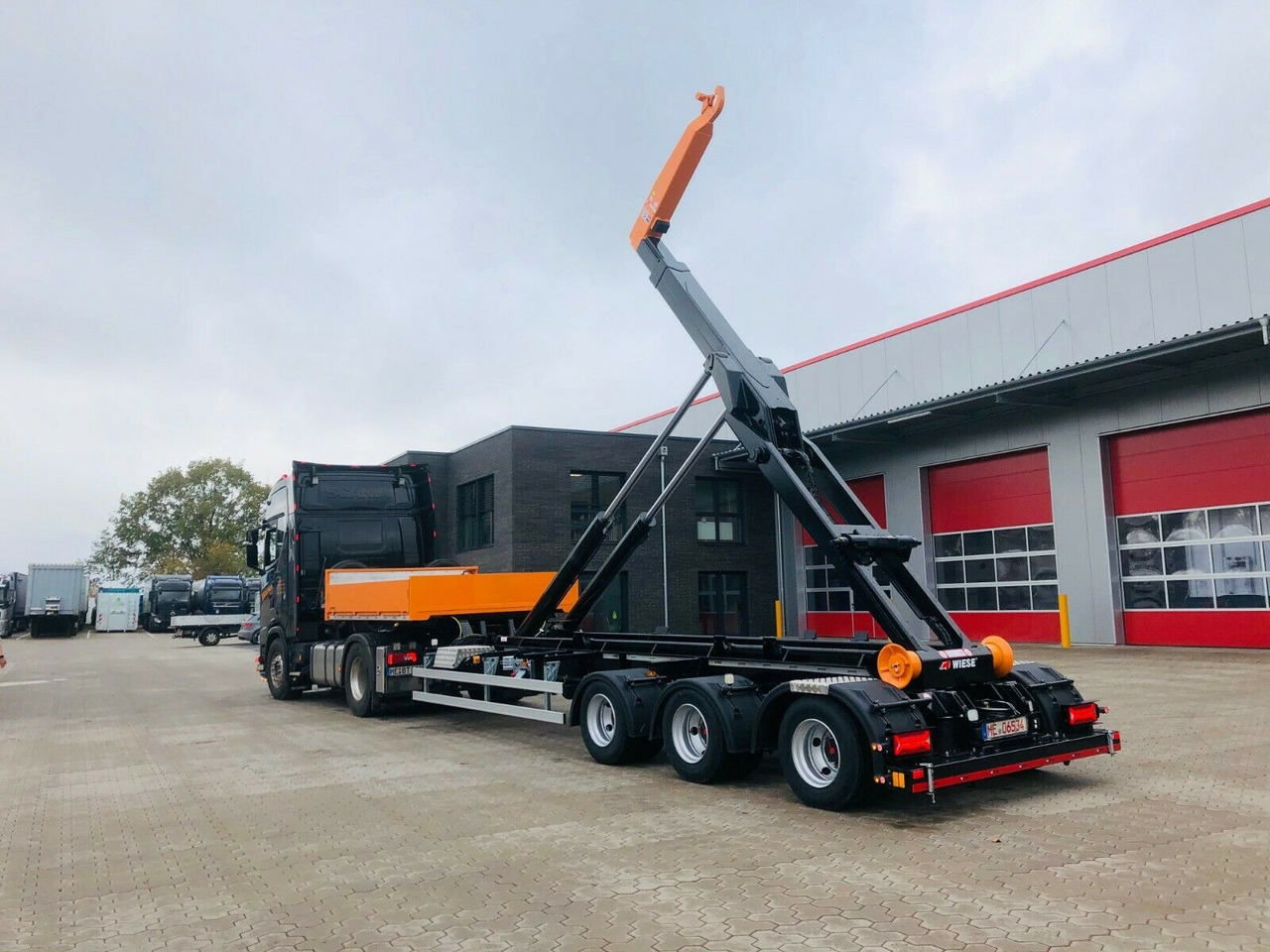Auflieger Abrollkipper Hakenlift Hookliftloader - نصف مقطورة لنقل الحاويات: صورة 1 Auflieger Abrollkipper Hakenlift Hookliftloader - نصف مقطورة لنقل الحاويات: صورة 1