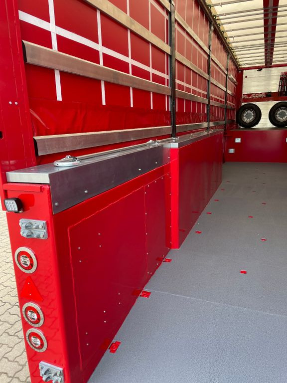 Innenlader Zwischenlader Gabelstaplertransporter - عربة منخفضة مسطحة نصف مقطورة: صورة 3 Innenlader Zwischenlader Gabelstaplertransporter - عربة منخفضة مسطحة نصف مقطورة: صورة 3
