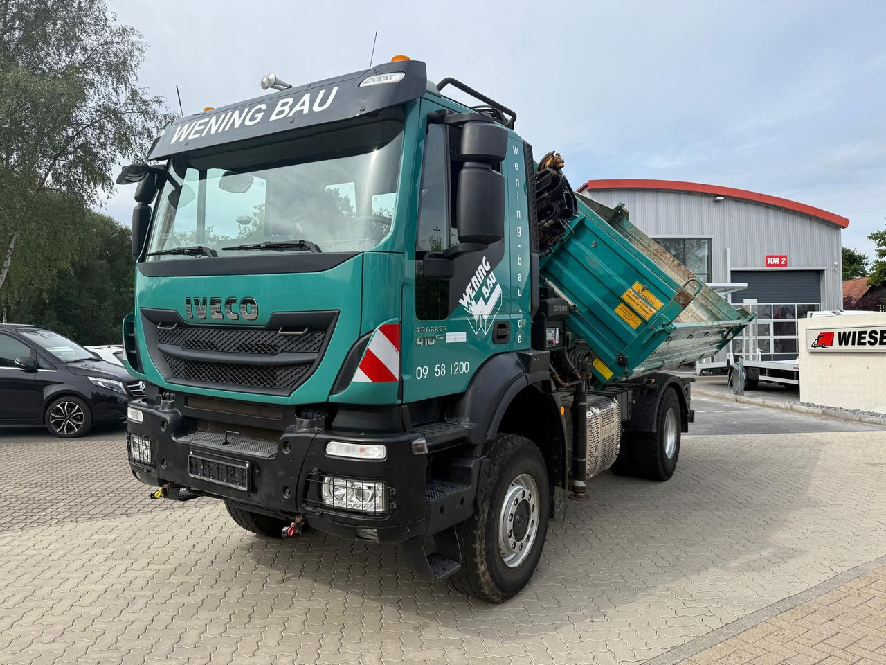 Iveco AD190 T/W Trakker 410 4x4 Allrad Kran KipperHIAB - شاحنة قلاب, شاحنة كرين: صورة 1 Iveco AD190 T/W Trakker 410 4x4 Allrad Kran KipperHIAB - شاحنة قلاب, شاحنة كرين: صورة 1