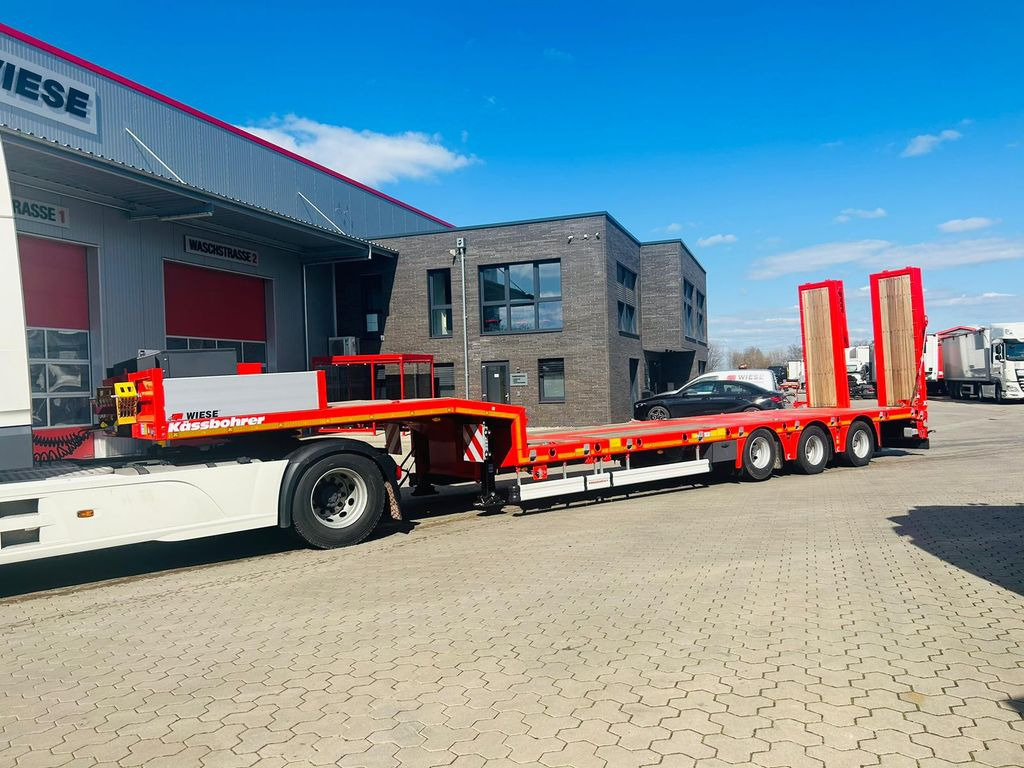 Kässbohrer K.SLA 3 ausziehbarer tele Tiefbett Auflieger - عربة منخفضة مسطحة نصف مقطورة: صورة 1 Kässbohrer K.SLA 3 ausziehbarer tele Tiefbett Auflieger - عربة منخفضة مسطحة نصف مقطورة: صورة 1