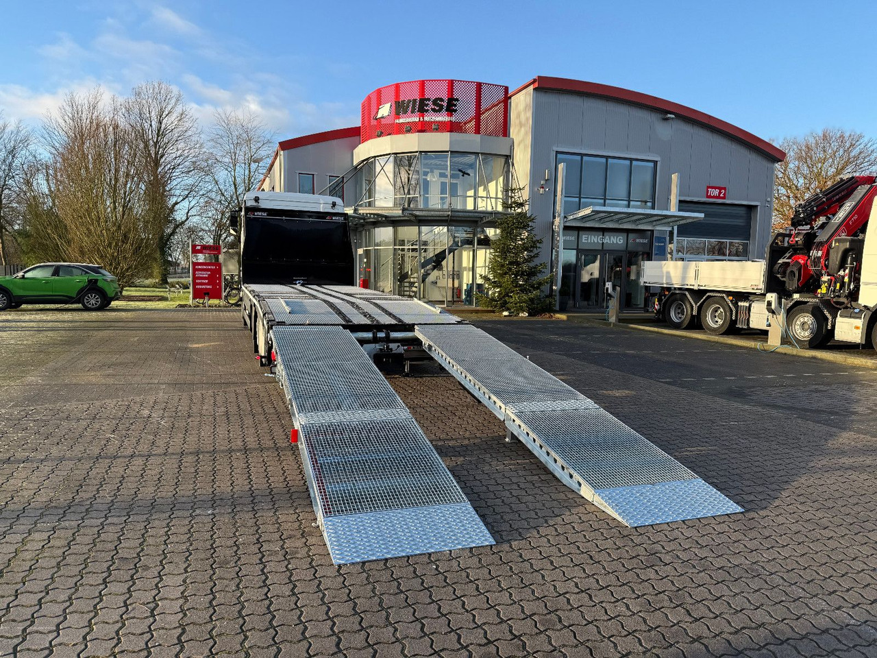 MAN Baumaschinen- Arbeitsbühnentransporter Rampen - شاحنات مسطحة: صورة 4 MAN Baumaschinen- Arbeitsbühnentransporter Rampen - شاحنات مسطحة: صورة 4