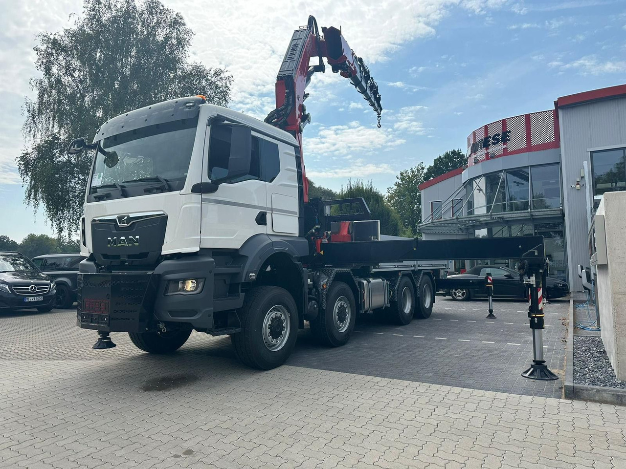 MAN TGS 41.520 8x8 mit Fassi Ladekran F710RA.2.26 - شاحنات مسطحة: صورة 2 MAN TGS 41.520 8x8 mit Fassi Ladekran F710RA.2.26 - شاحنات مسطحة: صورة 2