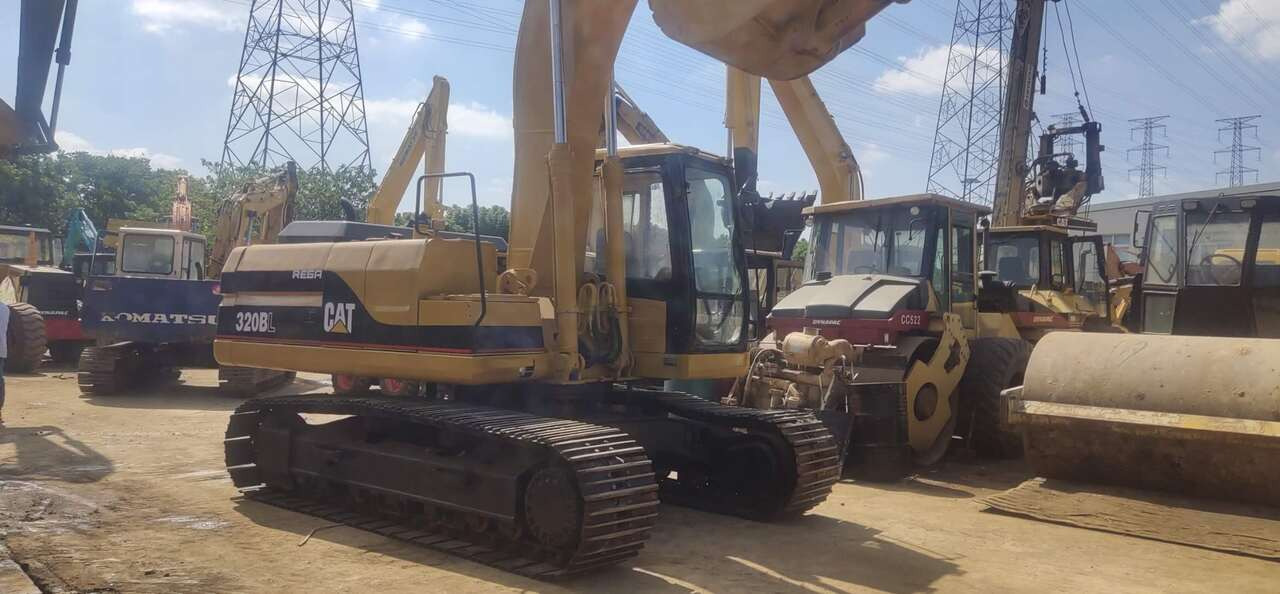 CATERPILLAR 320BL - حفار زحاف: صورة 1 CATERPILLAR 320BL - حفار زحاف: صورة 1