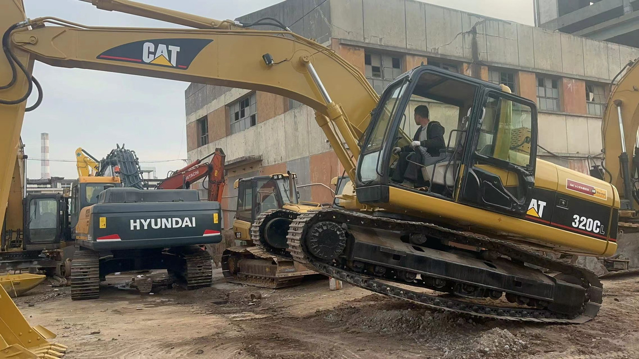 CATERPILLAR 320C 320B 320BL 325B - حفار زحاف: صورة 2 CATERPILLAR 320C 320B 320BL 325B - حفار زحاف: صورة 2