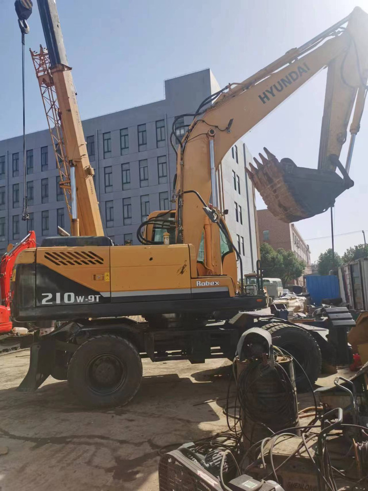 HYUNDAI R210W-9 - حفارة دولاب: صورة 1 HYUNDAI R210W-9 - حفارة دولاب: صورة 1