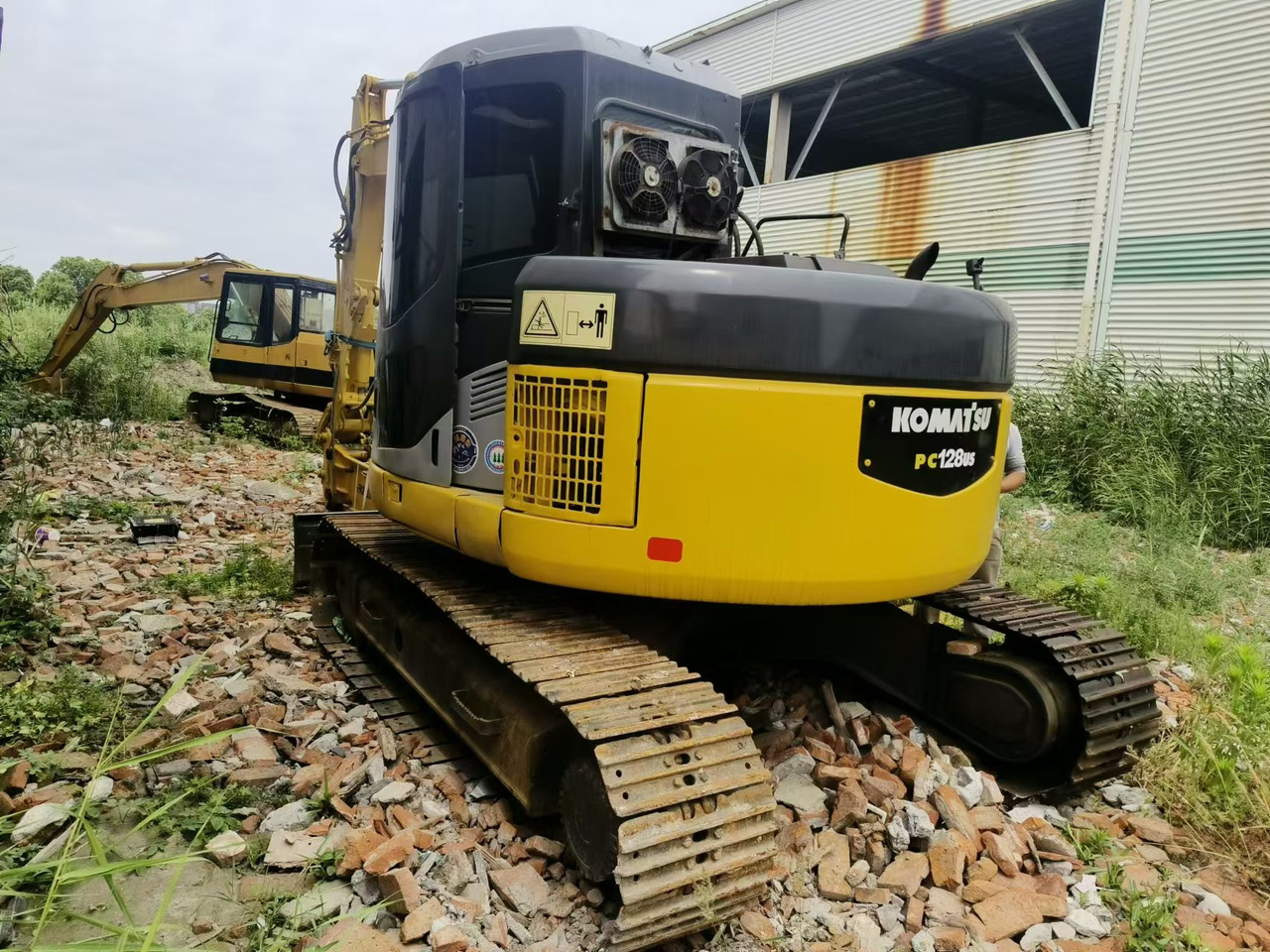 KOMATSU PC128US - حفارة: صورة 2 KOMATSU PC128US - حفارة: صورة 2