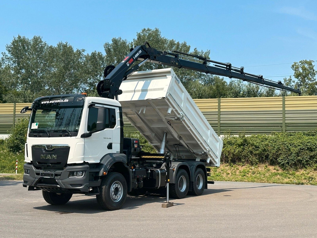 MAN TGS 33.440 6x4 /3-Seiten- Kipper / HIAB 228-6 - شاحنة قلاب, شاحنة كرين: صورة 1 MAN TGS 33.440 6x4 /3-Seiten- Kipper / HIAB 228-6 - شاحنة قلاب, شاحنة كرين: صورة 1