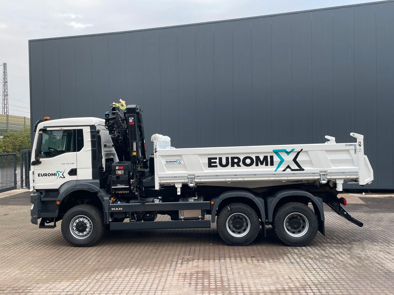 MAN TGS 33.440 6x6 /3-Seiten- Kipper / HIAB 228-6 - شاحنة قلاب, شاحنة كرين: صورة 2 MAN TGS 33.440 6x6 /3-Seiten- Kipper / HIAB 228-6 - شاحنة قلاب, شاحنة كرين: صورة 2