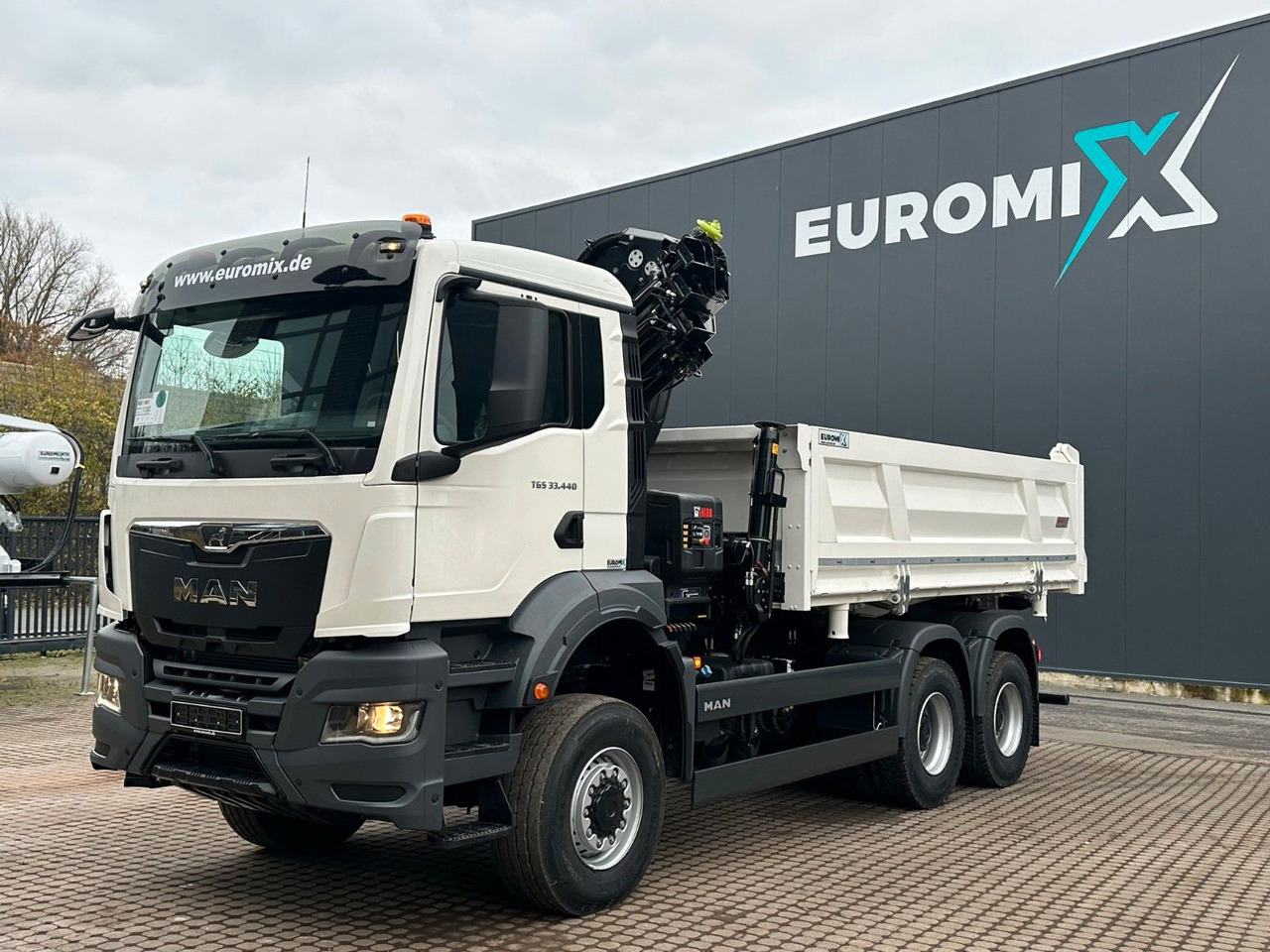 MAN TGS 33.440 6x6 /3-Seiten- Kipper / Kran HIAB 302 - شاحنة قلاب, شاحنة كرين: صورة 1 MAN TGS 33.440 6x6 /3-Seiten- Kipper / Kran HIAB 302 - شاحنة قلاب, شاحنة كرين: صورة 1