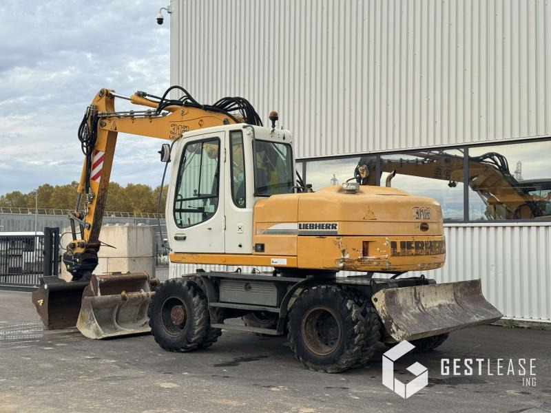 Liebherr A312 Litronic - حفارة دولاب: صورة 2 Liebherr A312 Litronic - حفارة دولاب: صورة 2