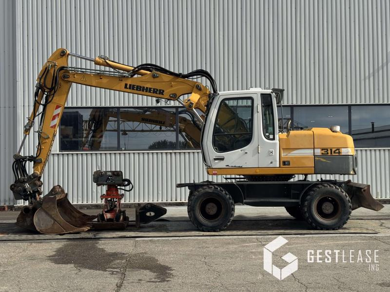 Liebherr A314 Litronic - حفارة دولاب: صورة 2 Liebherr A314 Litronic - حفارة دولاب: صورة 2