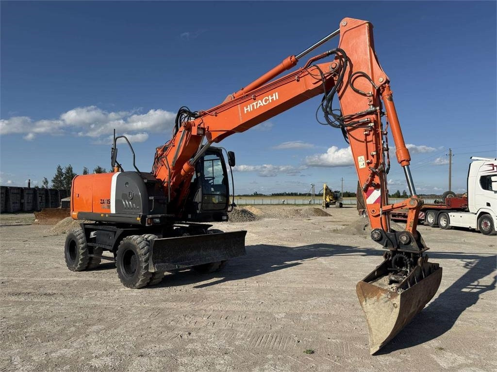 حفارة دولاب Hitachi ZX 140 W: صورة 6